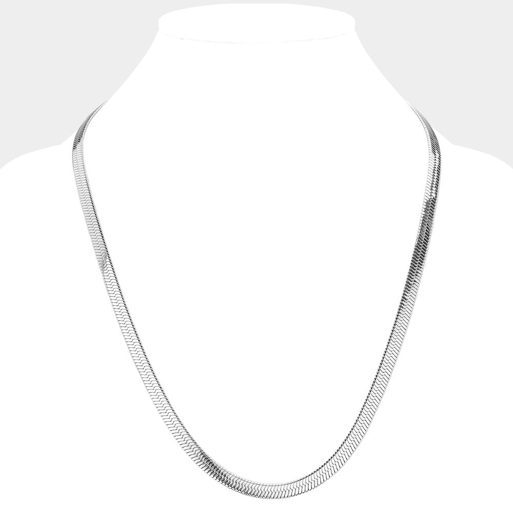 Rhodium 24-inch, 7mm Stainless Steel Herringbone Chain Necklace offers a classic and durable design for everyday wear. Made from high-quality stainless steel, it provides both strength and style. The herringbone pattern adds a touch of sophistication, making it a versatile accessory for any outfit.