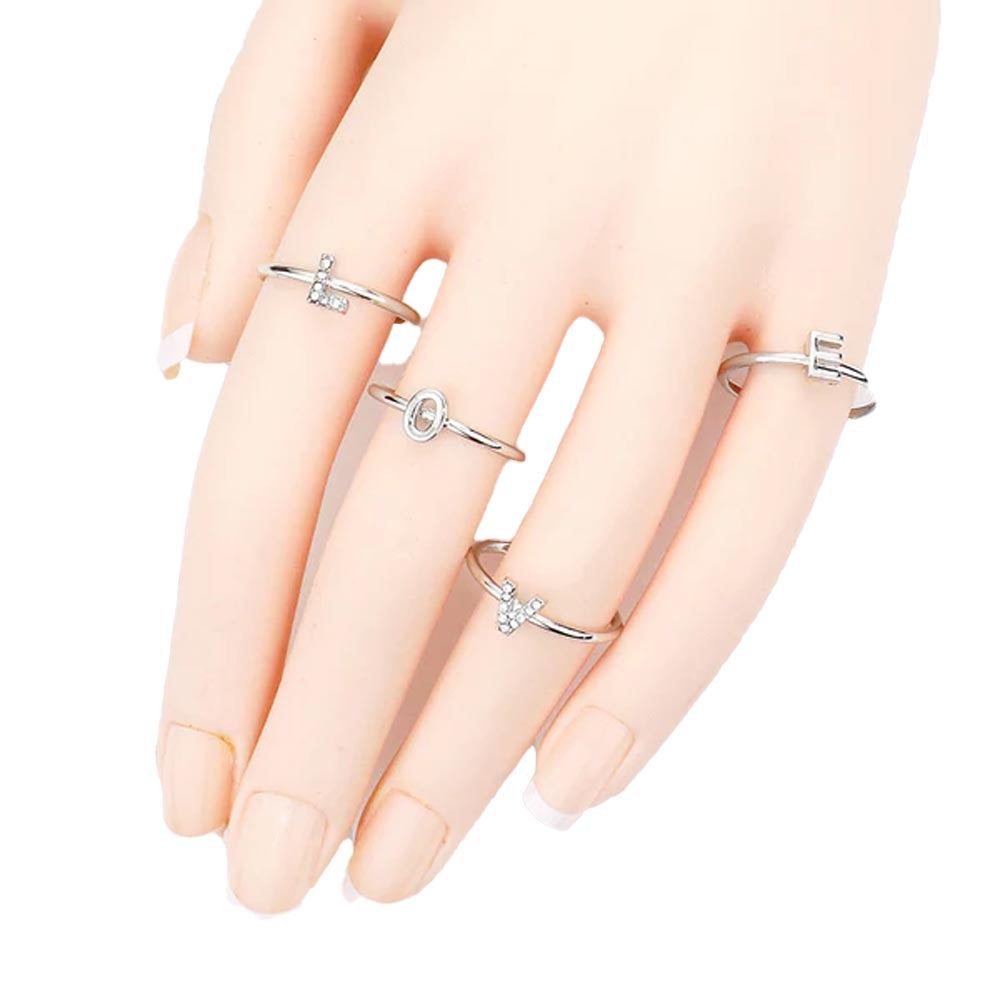 4PCS - LOVE Rhinestone Embellished Message Rings features the word "LOVE" in a sleek, polished design. Each ring is crafted to deliver a subtle sparkle, making them ideal for layering or wearing alone to add a sophisticated statement to any outfit. Perfect for expressing sentiment through elegant accessories, these rings blend durable craftsmanship with refined aesthetics, suitable for everyday wear or special occasions. 