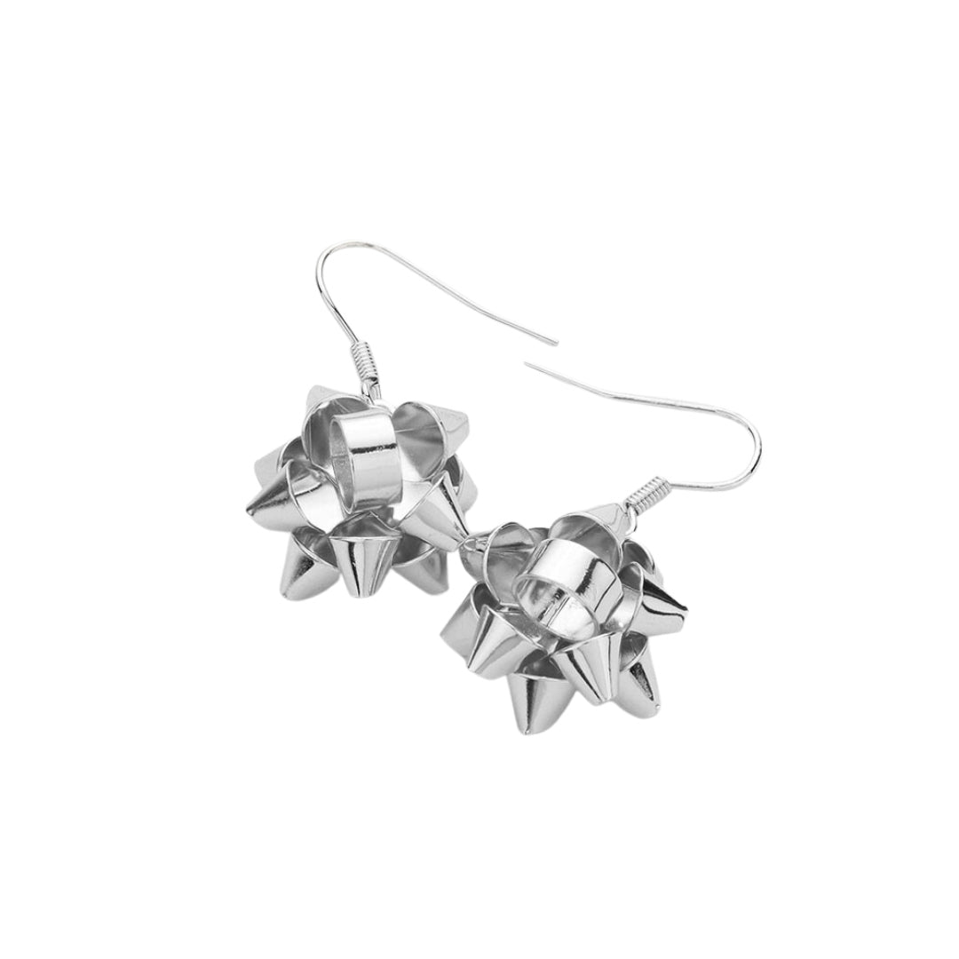 Rhodium Beautiful Christmas Gift Bow Dangle Earrings, are beautifully designed with a bow theme that will make a glowing touch on everyone. These beautiful earrings are the ultimate representation of your class & beauty. These are the perfect gift for Christmas, especially for your friends, family, and the persons you love.