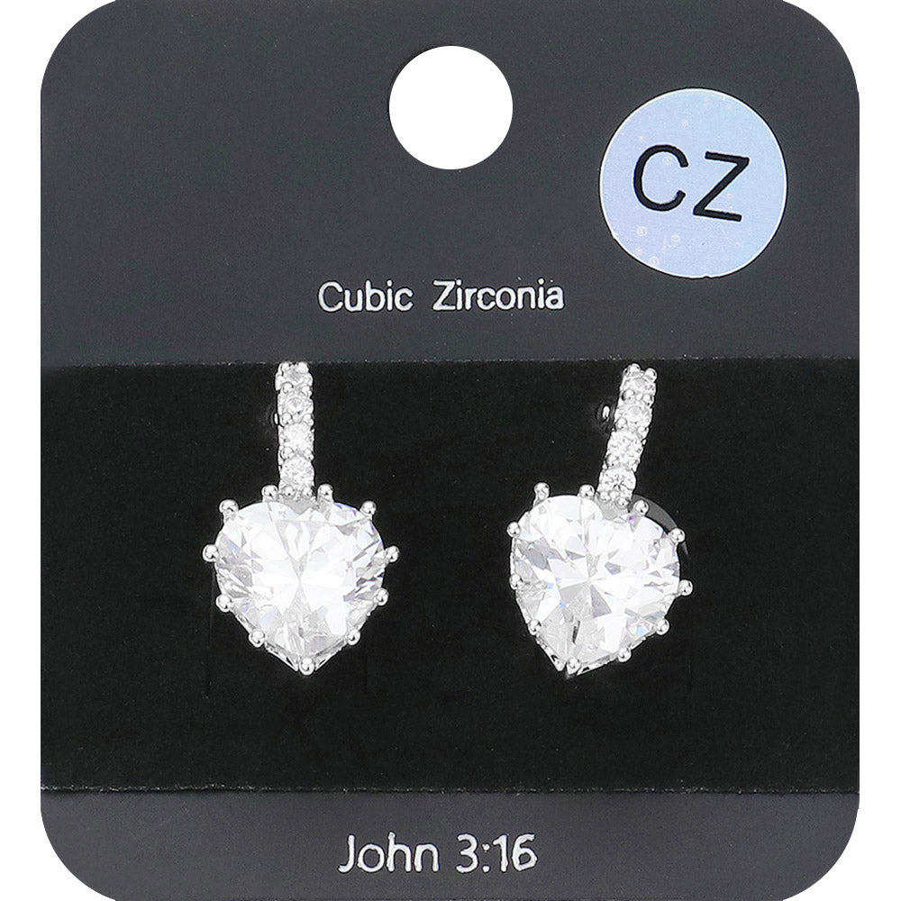 Rhodium CZ Heart Evening Huggie Earrings. Made with stunning CZ stones, these elegant earrings are perfect for any evening occasion. The huggie design ensures a secure and comfortable fit, while the heart shape adds a touch of romance. Upgrade your jewelry collection with these must-have earrings.