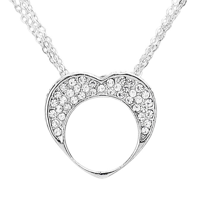 Rhodium Clear Crystal Rhinestone Necklace boasts a beautifully crafted Pave Heart Cut Out Pendant. Stunning and versatile, this necklace will add a touch of sparkle to any outfit. Made with high-quality materials, its durability ensures long-lasting wear. Bring a touch of glamour to your wardrobe with this stunning necklace.