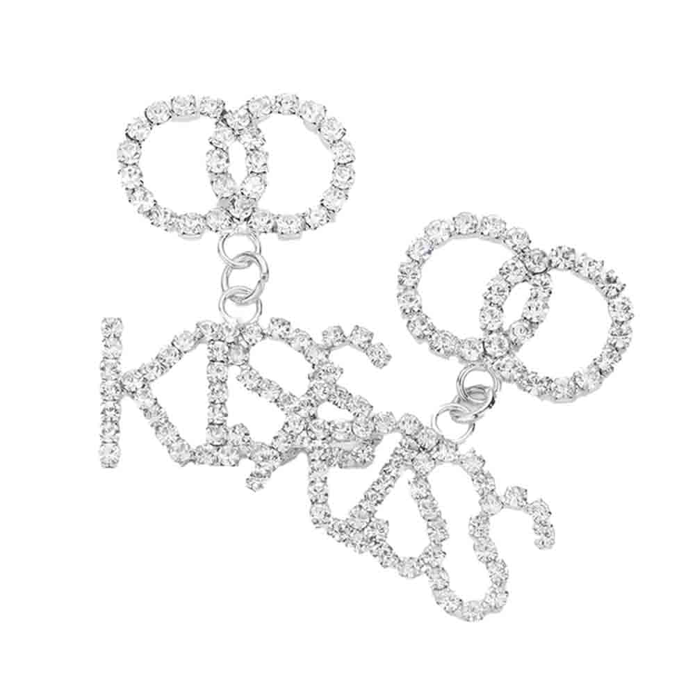 Rhodium KISS Rhinestone Embellished Message Dangle Earrings are the perfect accessory to add a touch of glamour to any outfit. The delicate dangle design adds movement and sparkle to your look, making you stand out from the crowd. Own these stunning earrings and shine like a star.
