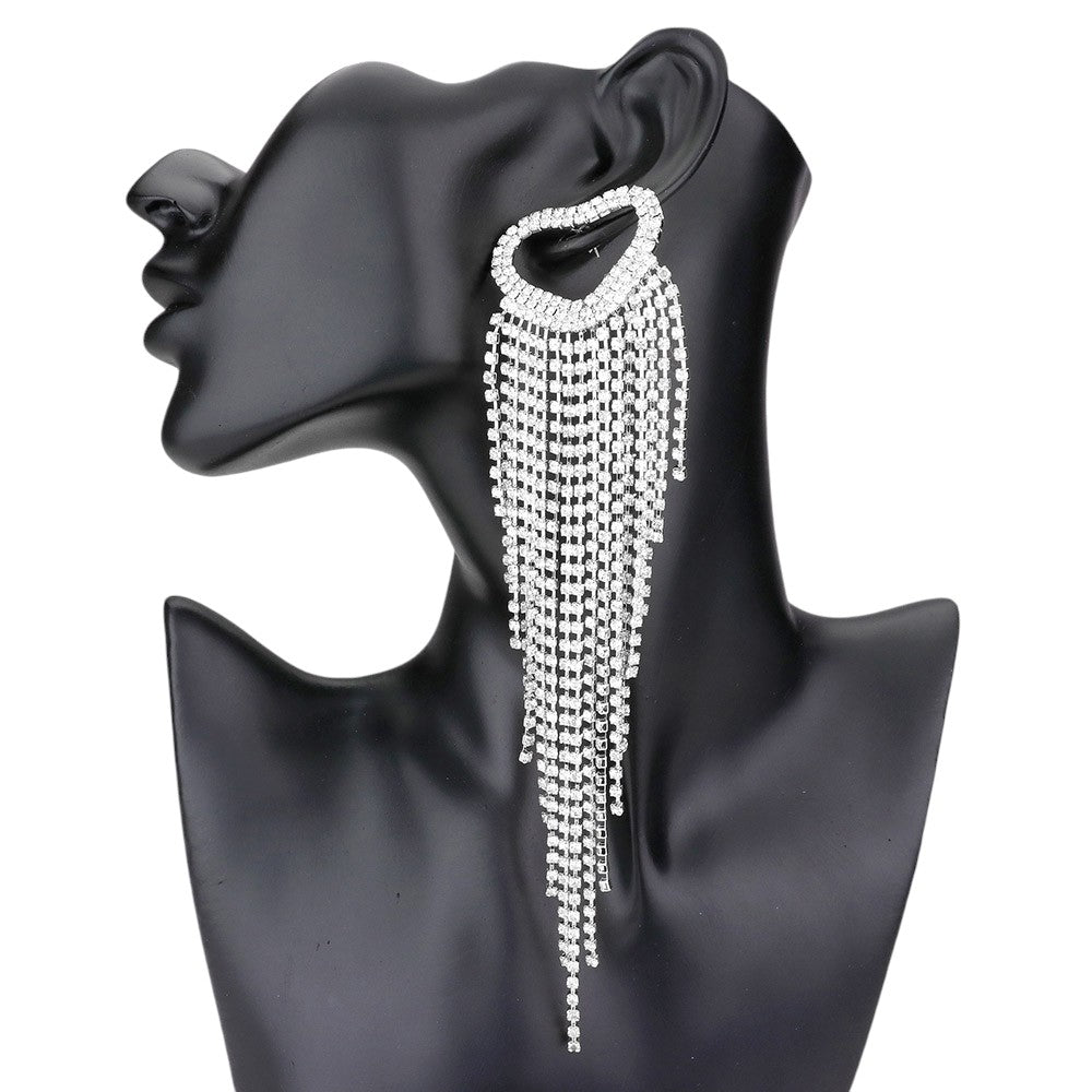 Rhodium Open Heart Accented Rhinestone Fringe Dangle Evening Earrings add elegance and sophistication to any outfit. The intricate design features a delicate open heart accent and sparkling rhinestone fringe, making them perfect for any occasion. Elevate your style with these glamorous earrings.