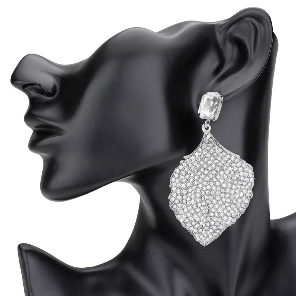 Rhodium Rhinestone Embellished Leaf Dangle Earrings, are perfect for any special event. The rhinestones are carefully placed to create an elegant design. These earrings are sure to turn heads and make you stand out from the crowd. Perfect gift for fashion-loving family members and friends, young adults, or to gift yourself.