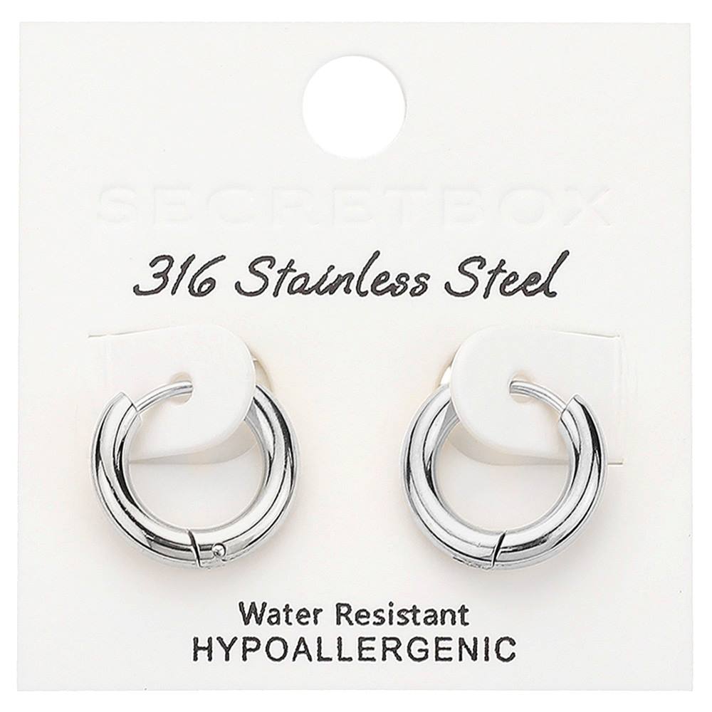 Rhodium SECRET BOXS Stainless Steel Huggie Hoop Earrings are made from high-quality materials designed for comfort and durability. With their sleek and stylish design, these earrings are the perfect addition to any outfit. Crafted from stainless steel, they are also hypoallergenic and suitable for sensitive ears. Upgrade your jewelry collection with these must-have earrings.