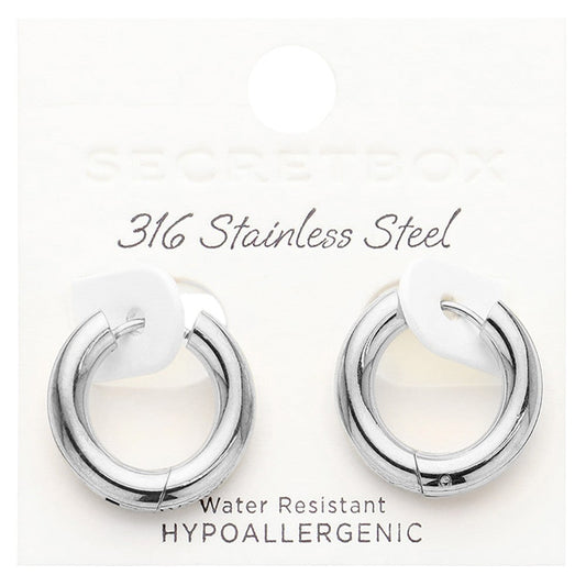 Rhodium SECRET BOX stainless steel round classic hoop earrings combine durability and style with a sleek design. Made from high-quality stainless steel, they are perfect for everyday wear and provide a classic and timeless look. Elevate your accessory game with these versatile and long-lasting earrings.