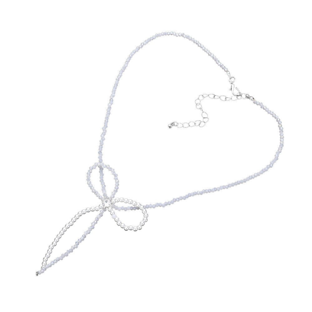 Rhodium SECRET BOX_Stone Pointed Faceted Beaded Bow Necklace is expertly crafted with precision and style. The pointed faceted beads create a unique and eye-catching design, while the delicate bow adds a touch of elegance. Perfect for adding a sophisticated touch to any outfit.