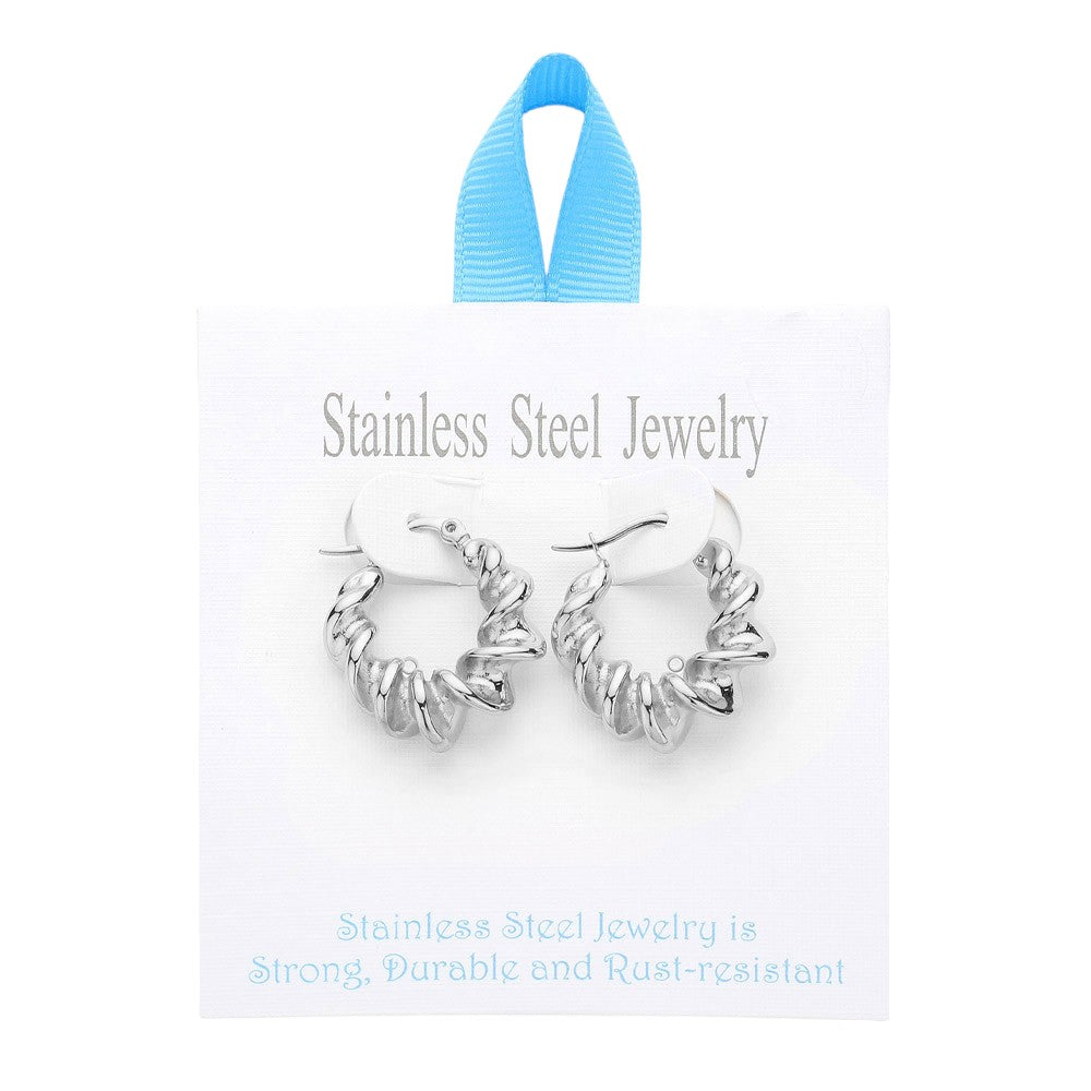 Rhodium Stainless Steel Spiral Hoop Earrings feature a unique pin catch design that securely holds the hoops in place. Made of high-quality stainless steel, these earrings are durable and hypoallergenic, making them perfect for everyday wear. Elevate your style with modern, stylish earrings that offer functionality and fashion.
