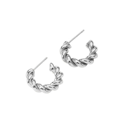 Rhodium Stainless steel twisted mini hoop earrings are a stylish addition to any outfit. Made with durable stainless steel, they are perfect for everyday wear and have a unique twisted design for a modern touch. Add these to your earring collection for a sleek and sophisticated look.