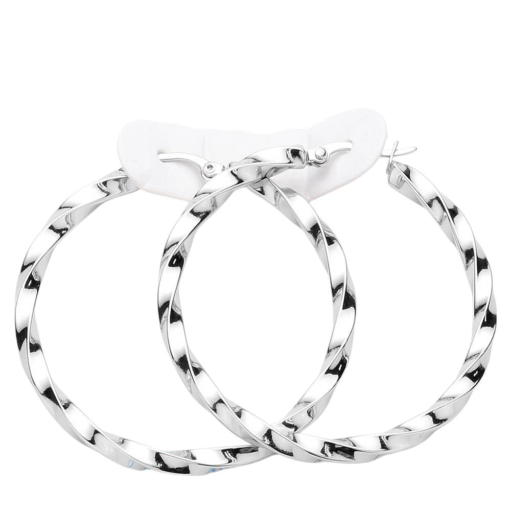 Rhodium Twisted Stainless Steel Hoop Pin Catch Earrings offer a unique twist on a classic design. The stainless steel material provides durability and a modern look, while the pin catch closure ensures secure wear. Elevate any outfit with these stylish and versatile earrings.