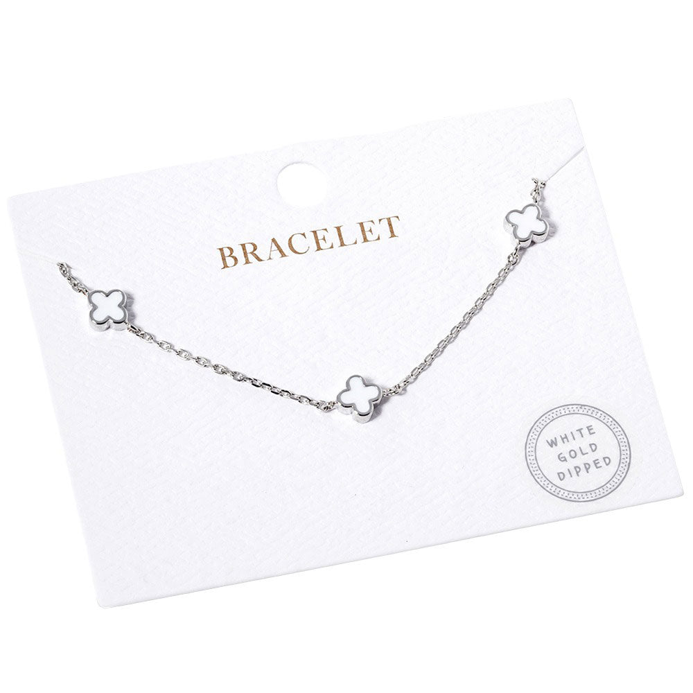 Rhodium White Gold Dipped Triple Quatrefoil Link Bracelet, is the perfect accessory for any outfit. Crafted using gold-dipped materials, it is lightweight, durable, and will not tarnish. A triple Quatrefoil Link design adds interest and style to any look. This beautiful bracelet can be a nice gift to your loved ones on any occasion.