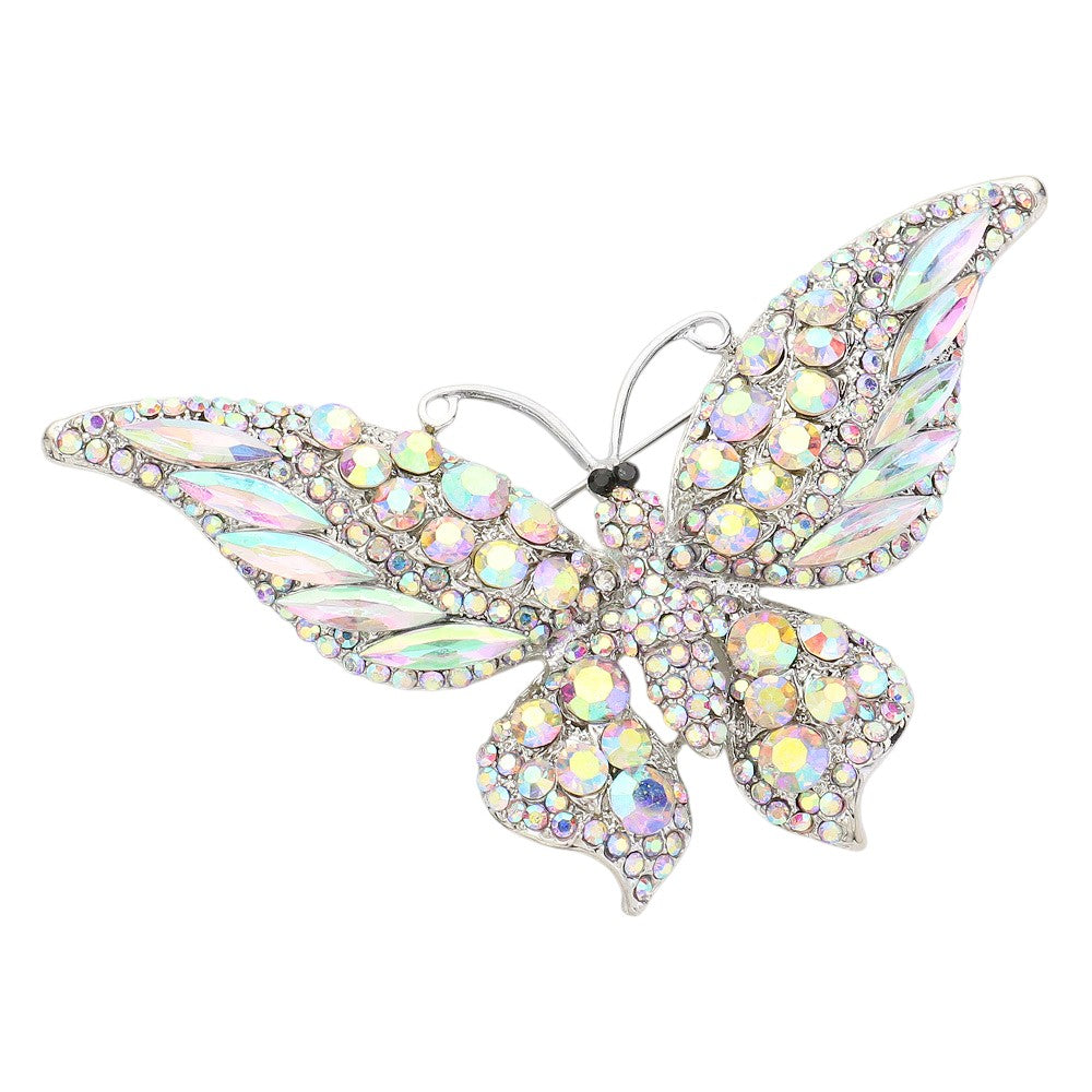Rhodium Glass Crystal Butterfly Pin Brooch is expertly crafted with sparkling glass crystals, adding a touch of elegance and sophistication to any outfit. With its timeless butterfly design, this tasteful accessory is perfect for any occasion. Enhance your ensemble with a touch of shimmer and charm.