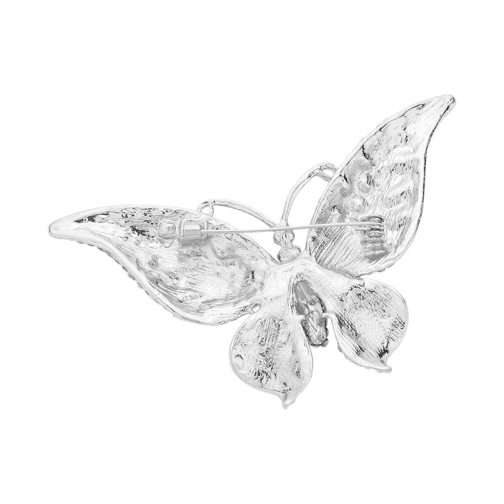 Rhodium Glass Crystal Butterfly Pin Brooch is expertly crafted with sparkling glass crystals, adding a touch of elegance and sophistication to any outfit. With its timeless butterfly design, this tasteful accessory is perfect for any occasion. Enhance your ensemble with a touch of shimmer and charm