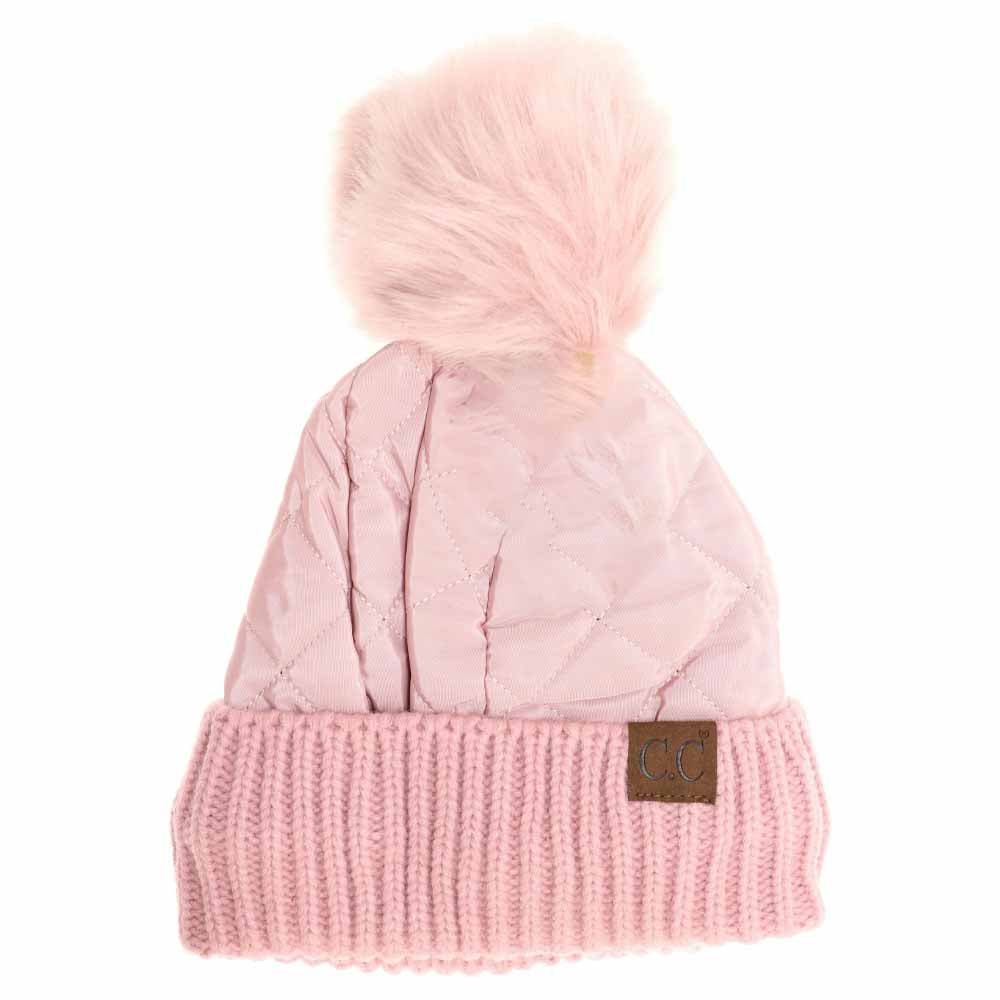 Rose Fleece Lined Quilted Puffer CC Pom Beanie combines advanced insulation with refined style to protect against cold weather. Featuring a quilted puffer exterior paired with a soft fleece lining, this beanie offers superior warmth and comfort. The iconic CC pom adds a touch of sophistication, making it suitable for both functional wear and elevated casual looks. Engineered for durability and lightweight warmth, it's an expert choice for those needing reliable cold-weather headgear. 