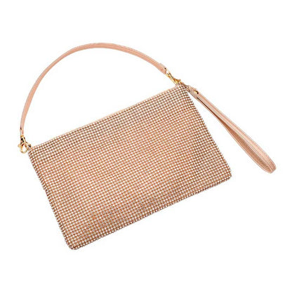 Rose Gold Bling Flat Clutch Crossbody Bag, is perfect for the fashionista on the go. Crafted from high-quality materials, the bag features a chic bling design with a flat clutch and adjustable crossbody strap for hands-free ease. Perfect for special occasions, get ready to sparkle and shine!