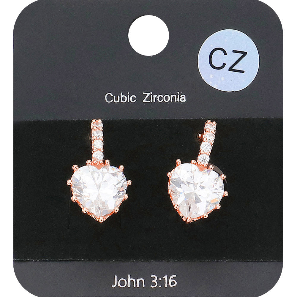 Rose Gold CZ Heart Evening Huggie Earrings. Made with stunning CZ stones, these elegant earrings are perfect for any evening occasion. The huggie design ensures a secure and comfortable fit, while the heart shape adds a touch of romance. Upgrade your jewelry collection with these must-have earrings.