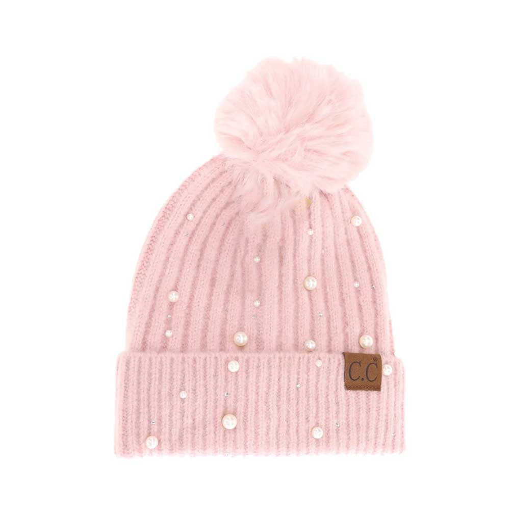 Rose C.C Pearl Embellishments Pom Pom Beanie Hat, this stylish beanie is made from high-quality material for a comfortable and snug fit. Featuring pearl embellishments and a pom pom detail, this hat is sure to keep you looking stylish and chic in chilly weather. Perfect winter gift for friends and family.