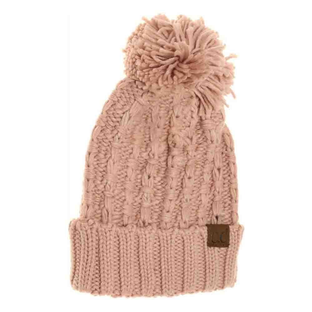 Rose Slipstitch Pom Beanie expertly blends functional warmth with refined design. Crafted with a textured slipstitch knit, it ensures durability and a snug fit while maintaining breathability. The added pom offers a subtle yet distinctive accent, making this beanie an essential piece for both outdoor protection and polished winter style. 
