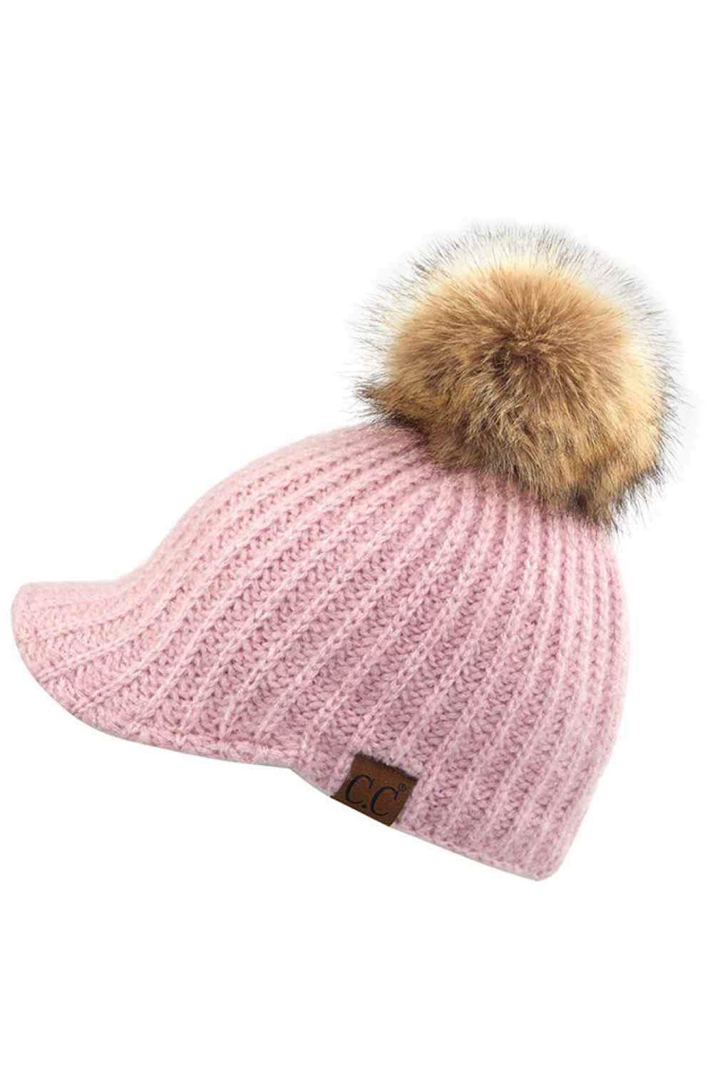 Rose Stay cozy with this knitted brim beanie featuring a plush pom pom detail. Crafted from a soft blend of 75% acrylic, 22% polyester, and 3% spandex, this winter essential delivers warmth and comfort in a versatile style. Available in nine rich colors including Beige, Berry, Dark Denim, Heather Gray, Ivory, Pistachio, Rose, Steel Blue, and Violet Purple. The ribbed knit construction and faux fur pom add texture and visual interest to any cold-weather outfit. Hand wash and lay flat to dry for lasting quali