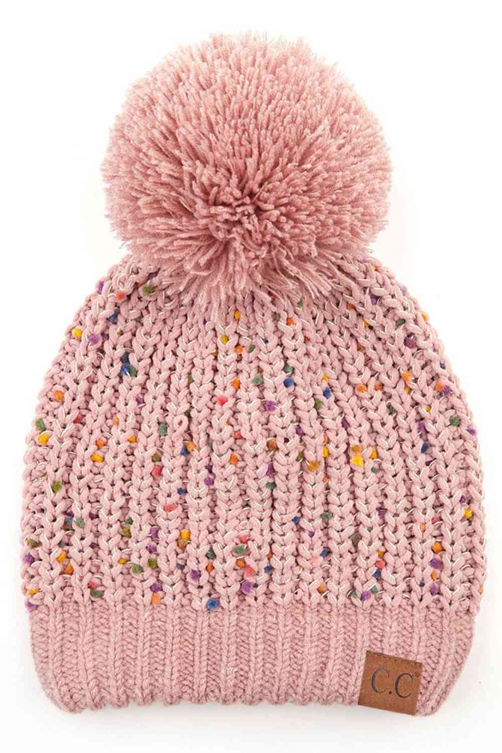 Rose Elevate your winter wardrobe with this C.C Confetti Chenille Knit Pom Beanie, crafted from a premium blend of 50% acrylic, 43% polyester, and 7% nylon for durability and comfort. The soft chenille knit texture pairs beautifully with a cozy pom detail, making it perfect for both indoor and outdoor wear.