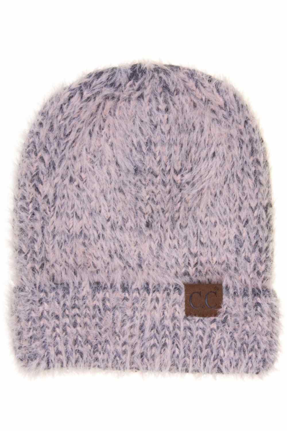 Rose The C.C Fuzzy Soft Beanie is crafted from ultra-soft, plush knit fabric that feels gentle and cozy against the skin. Designed for everyday comfort and warmth, it adds a simple yet stylish touch to any cold-weather outfit.