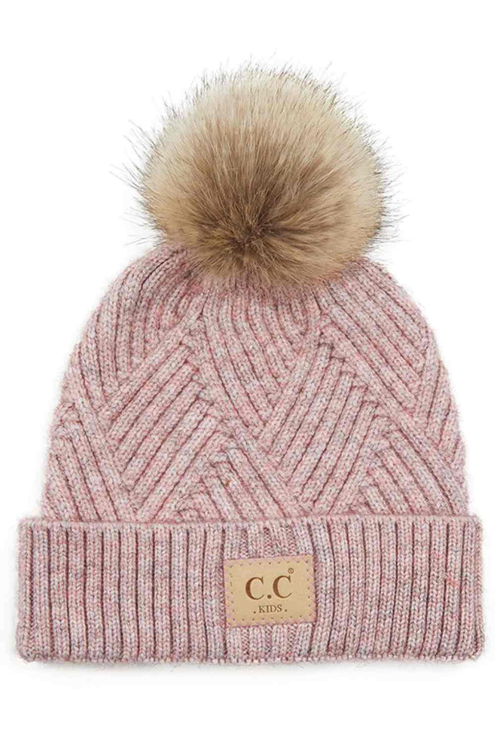Rose Keep your little one cozy with this C.C Kids Knit Beanie, featuring a playful diagonal stripes criss-cross pattern. Crafted from a soft blend of 47% rayon, 31% PBT, and 22% nylon, this beanie offers warmth and durability for everyday wear.