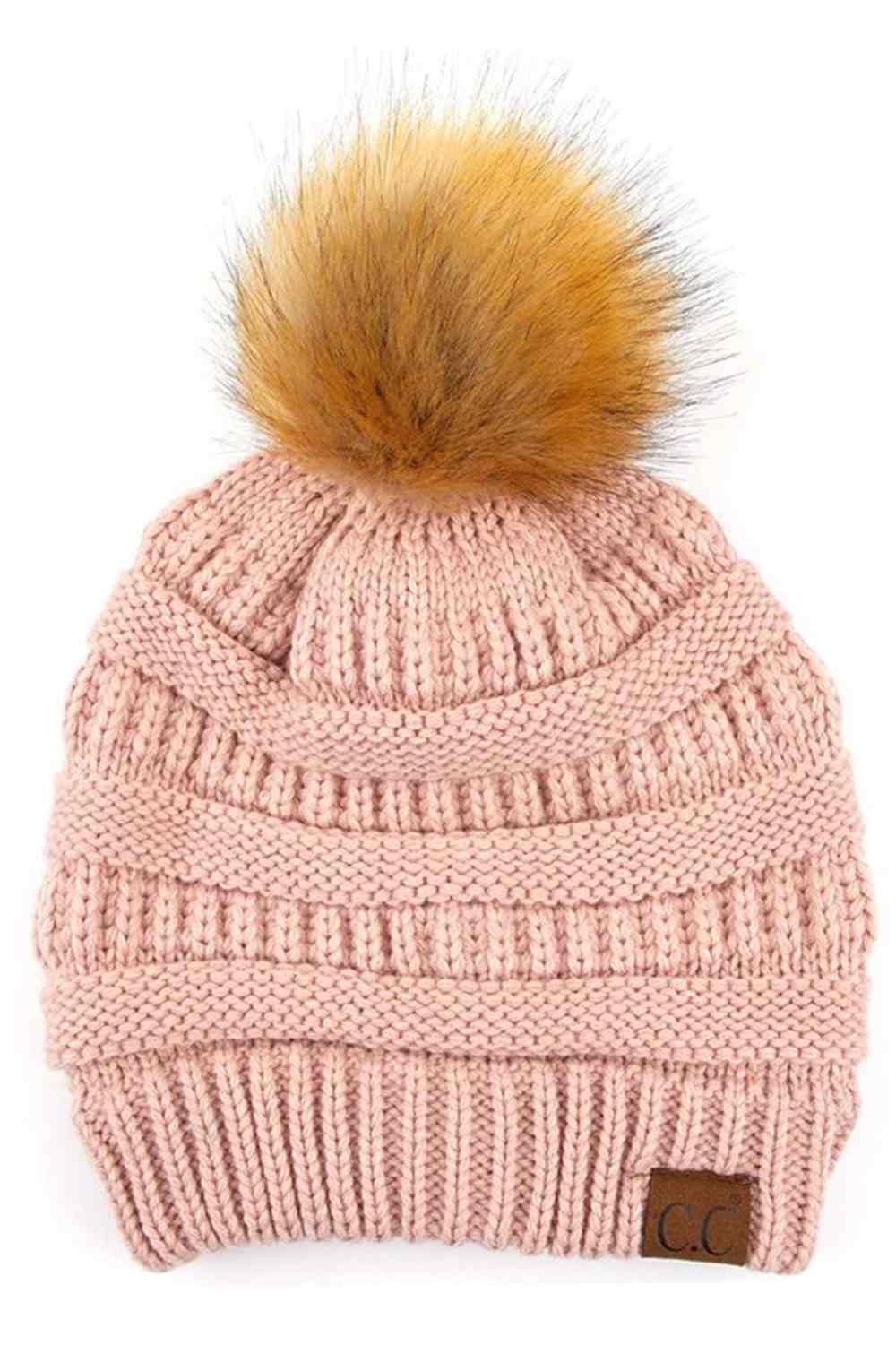 Rose Stay warm and cozy with this classic C.C Pom Pom Knit Beanie, crafted from 100% soft acrylic for all-day comfort. The ribbed knit design adds texture and durability, while the signature pom pom on top brings a playful touch to any winter outfit. One size fits most, making it the perfect accessory for everyone. Ideal for cold weather adventures or casual everyday wear.