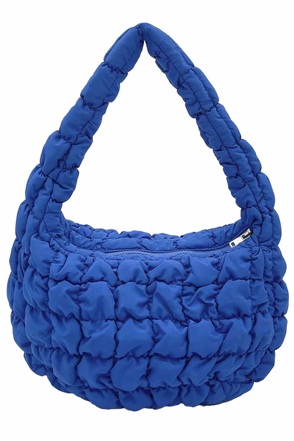 Royal Blue Compact quilted bag crafted from durable 100% polyester with a timeless solid design. Measuring 8.7" x 11.8" x 3.15", it's the perfect size for everyday essentials, travel accessories, or as a versatile organizer. The quilted texture adds visual interest and subtle structure. Ideal for on-the-go convenience with a sleek, minimalist aesthetic that pairs effortlessly with any outfit.