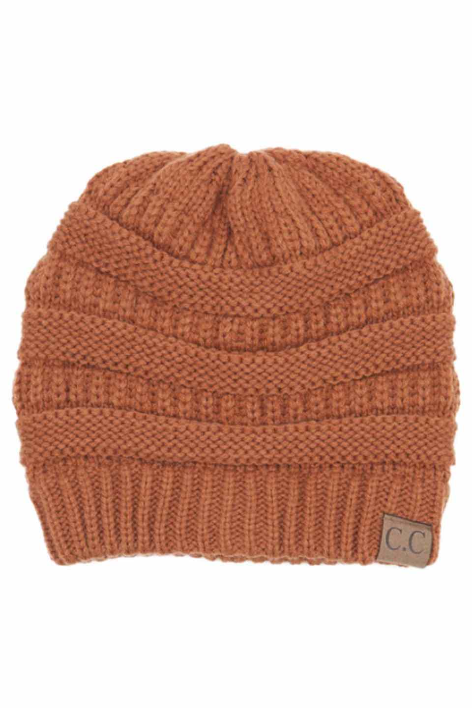 Rust C.C Ribbed Knit Solid Color Beanie offers a timeless design with durable ribbed knitting, ensuring a snug and comfortable fit. Crafted for warmth and versatility, this beanie is perfect for everyday wear, providing reliable protection against cold weather while maintaining a sleek, minimalist style that complements any outfit. Its solid color adds understated appeal, making it an essential accessory for both casual and outdoor use. 