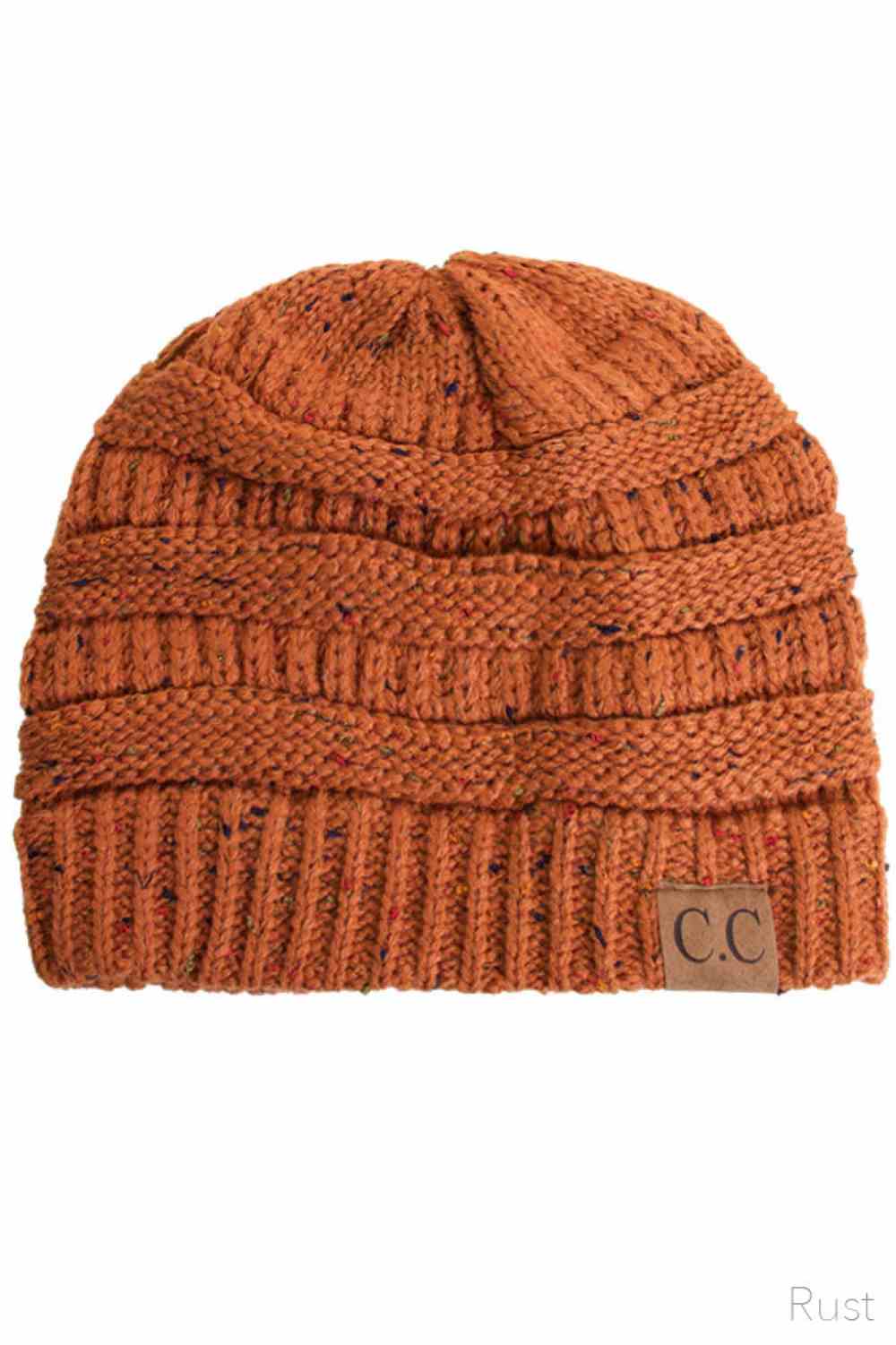 Rust Stay warm with timeless style in this C.C Confetti Cable Knit Beanie. Crafted from 100% soft acrylic, the classic cable knit texture provides excellent insulation while maintaining breathability for all-day comfort. The playful confetti detailing adds visual interest to this versatile essential. Lightweight yet durable, this beanie transitions seamlessly from casual outings to outdoor adventures, making it a reliable choice for any season.