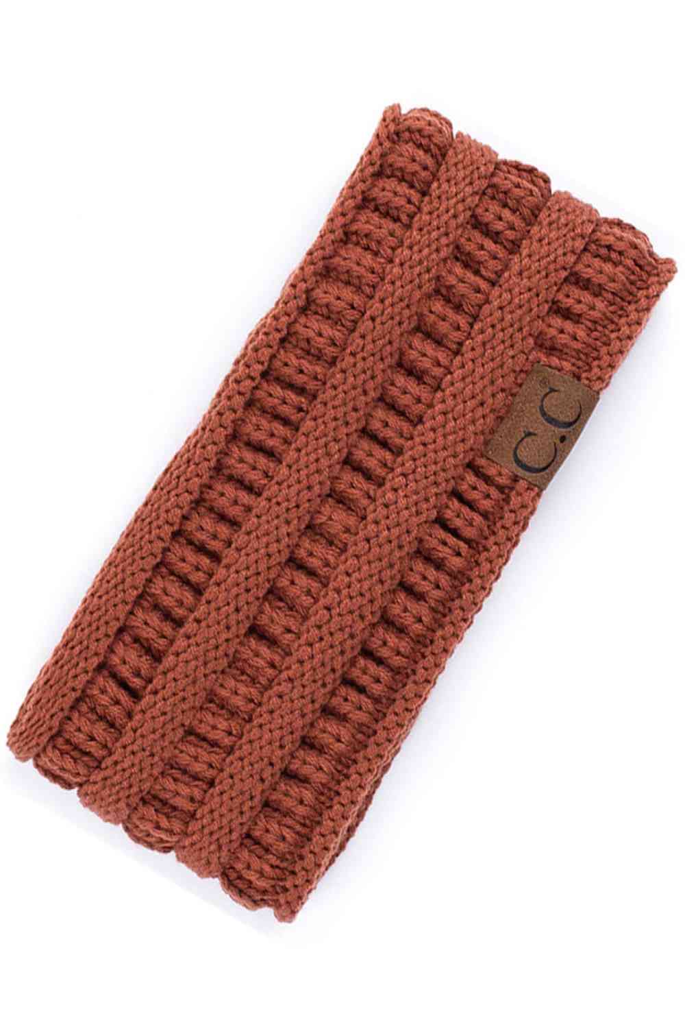 Rust Elevate your everyday style with the C.C Solid Ribbed Headwrap. Crafted from 100% acrylic, this versatile headwrap features a classic ribbed texture that adds dimension and visual interest. One size fits most, making it the perfect accessory for any occasion—whether you're running errands, hitting the gym, or making a fashion statement. Made in Korea with quality craftsmanship you can trust. Comfortable, durable, and effortlessly chic.