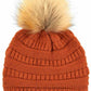 Rust Stay warm and cozy with this classic C.C Pom Pom Knit Beanie, crafted from 100% soft acrylic for all-day comfort. The ribbed knit design adds texture and durability, while the signature pom pom on top brings a playful touch to any winter outfit. One size fits most, making it the perfect accessory for everyone. Ideal for cold weather adventures or casual everyday wear.