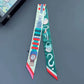 Madeline Love Green Accessory Print Silky Twilly Skinny Scarf - Scarves & Wraps