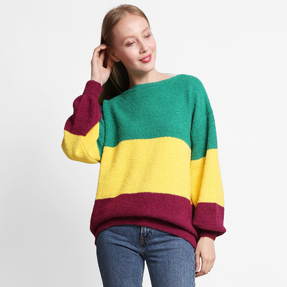 Multi Upgrade your winter wardrobe with our Mardi Gras Color Block Sweater. This stylish and cozy sweater features a vibrant color block design and is perfect for any festive occasion. Made from high-quality materials, it will keep you warm and fashionable all season long.