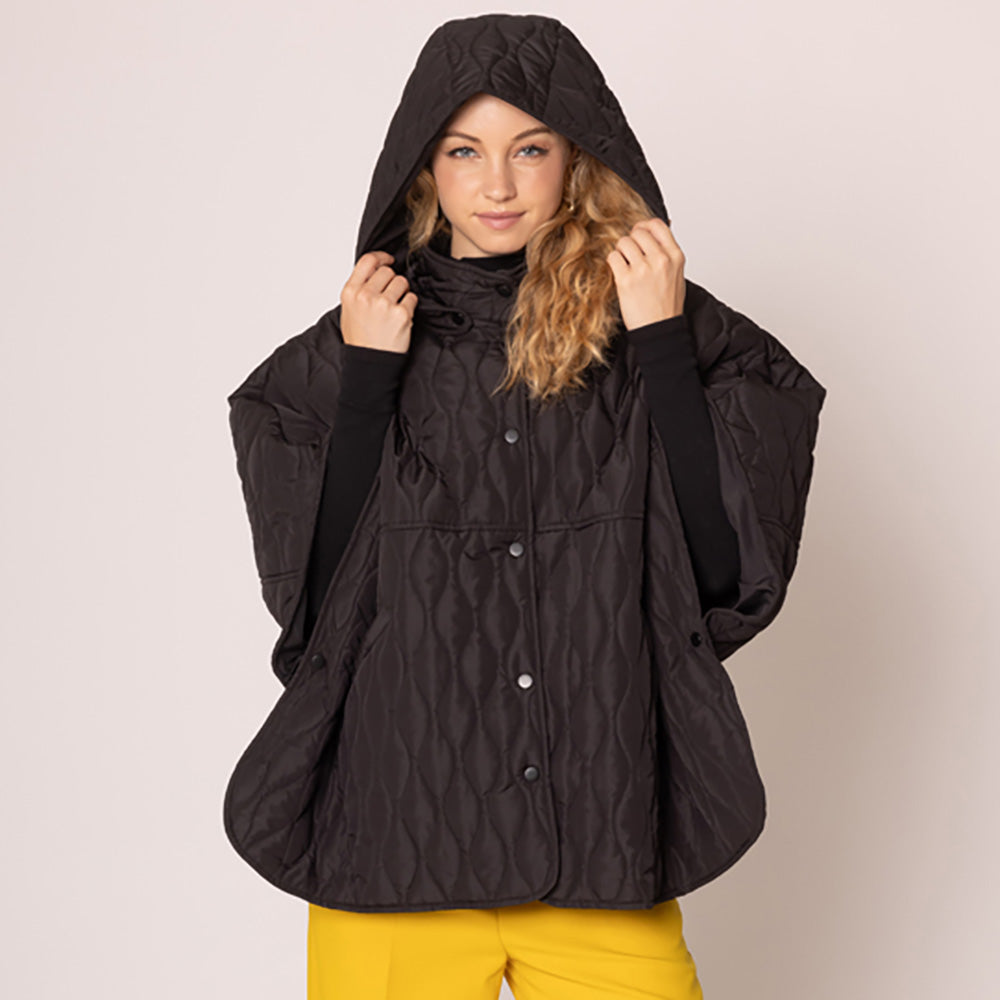 Black Stylish quilted cape jacket featuring a relaxed silhouette, button-up front, and attached hood for added comfort. Perfect for layering during cooler seasons, this versatile outerwear piece combines warmth with a modern, minimalistic design for effortless everyday style.