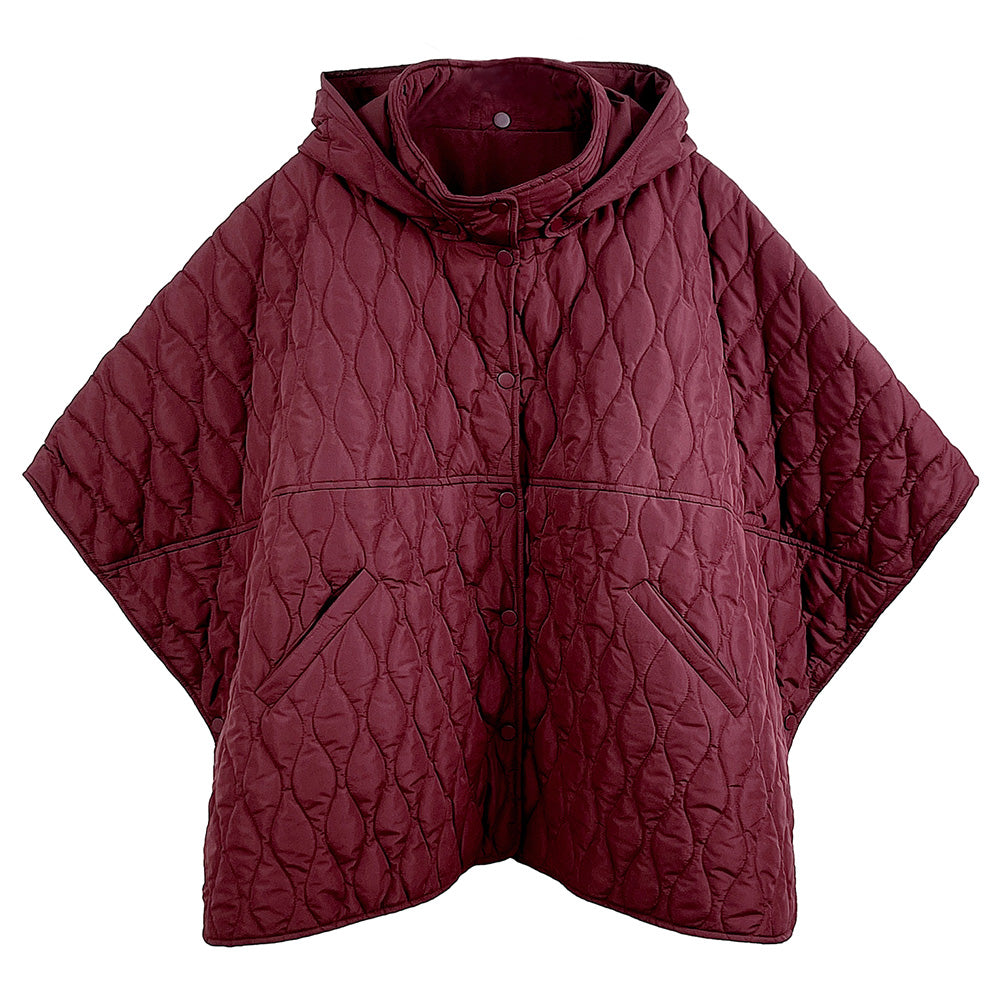 Burgundy Stylish quilted cape jacket featuring a relaxed silhouette, button-up front, and attached hood for added comfort. Perfect for layering during cooler seasons, this versatile outerwear piece combines warmth with a modern, minimalistic design for effortless everyday style.