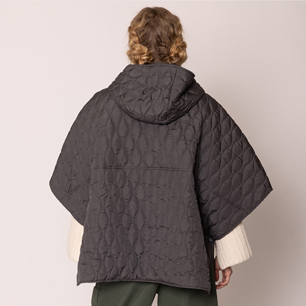 Charcoal Stylish quilted cape jacket featuring a relaxed silhouette, button-up front, and attached hood for added comfort. Perfect for layering during cooler seasons, this versatile outerwear piece combines warmth with a modern, minimalistic design for effortless everyday style.