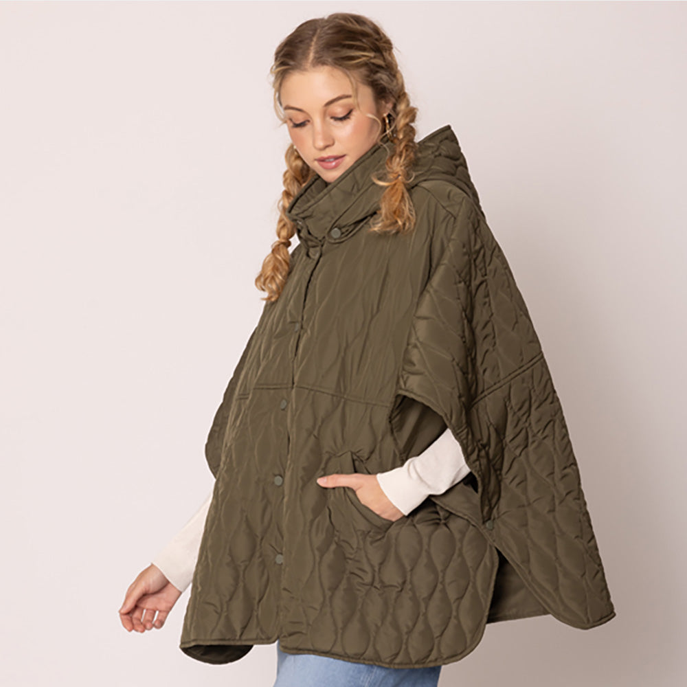Olive Green Stylish quilted cape jacket featuring a relaxed silhouette, button-up front, and attached hood for added comfort. Perfect for layering during cooler seasons, this versatile outerwear piece combines warmth with a modern, minimalistic design for effortless everyday style.