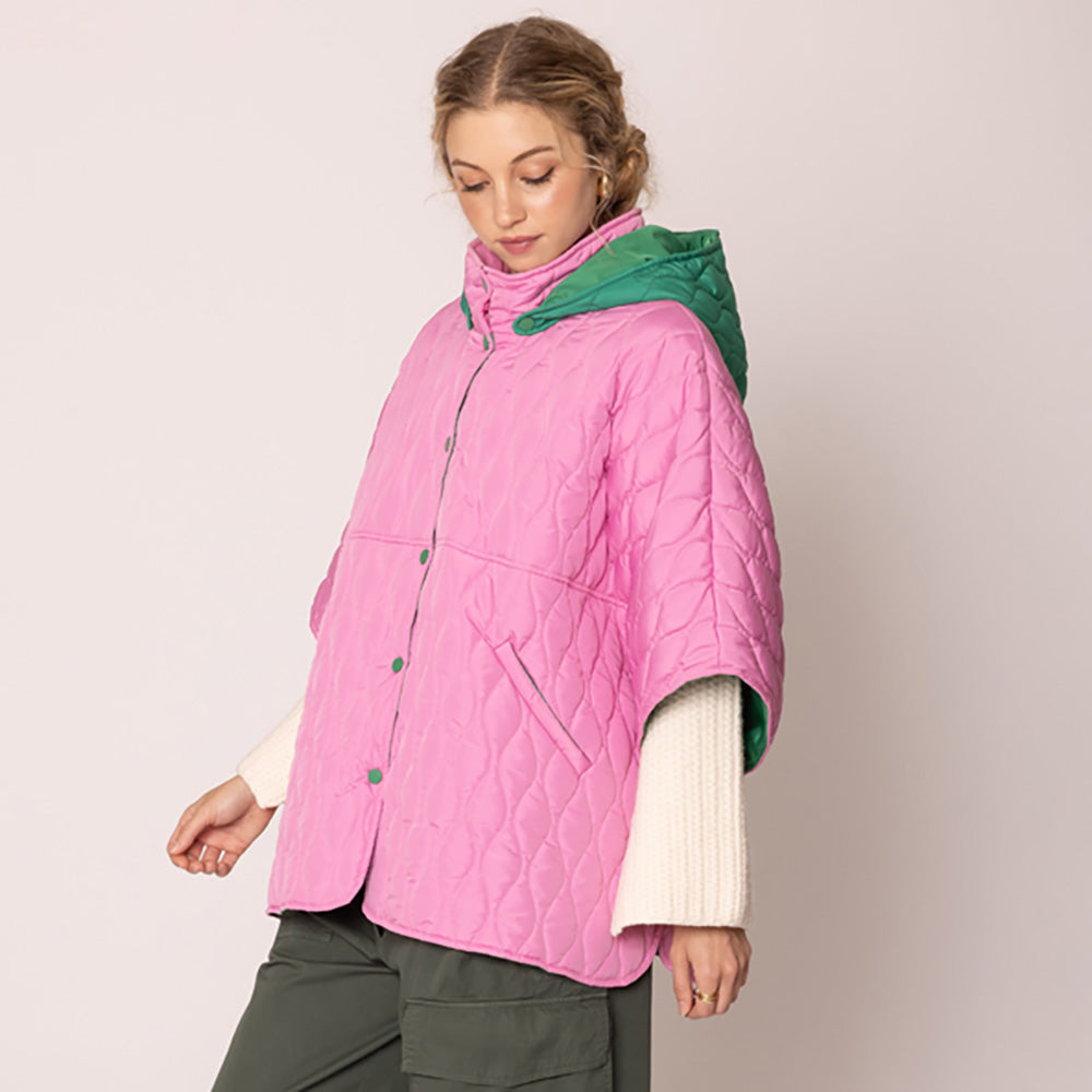 Pink&Green Stylish quilted cape jacket featuring a relaxed silhouette, button-up front, and attached hood for added comfort. Perfect for layering during cooler seasons, this versatile outerwear piece combines warmth with a modern, minimalistic design for effortless everyday style.