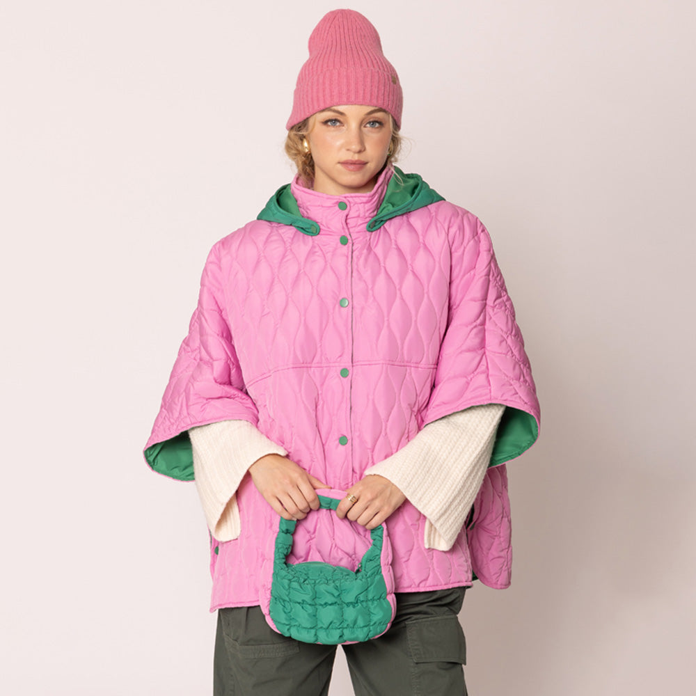 Pink&Green Stylish quilted cape jacket featuring a relaxed silhouette, button-up front, and attached hood for added comfort. Perfect for layering during cooler seasons, this versatile outerwear piece combines warmth with a modern, minimalistic design for effortless everyday style.