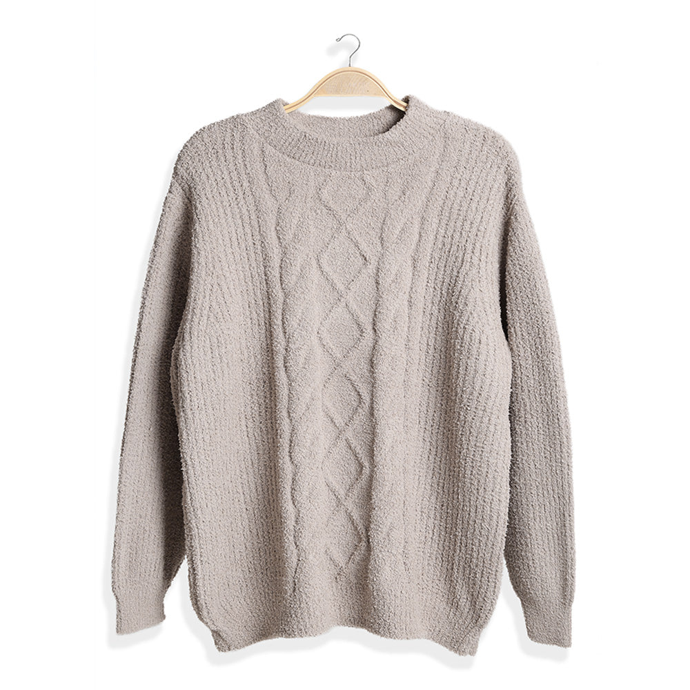 Wrap yourself in comfort with this Solid Color Ribbed Sweater, designed for effortless style and warmth. Its soft ribbed knit fabric offers a flattering fit and timeless look, perfect for pairing with jeans or skirts for any occasion.