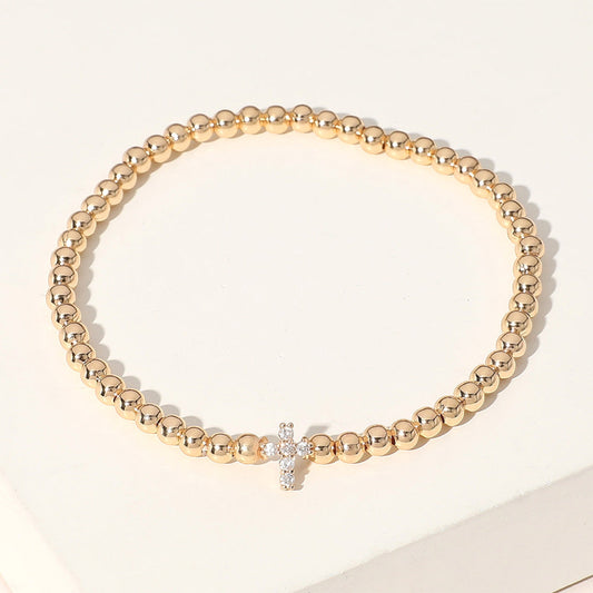Madeline Love Gold Stone Paved Cross Brass Ball Beaded Stretch Bracelet