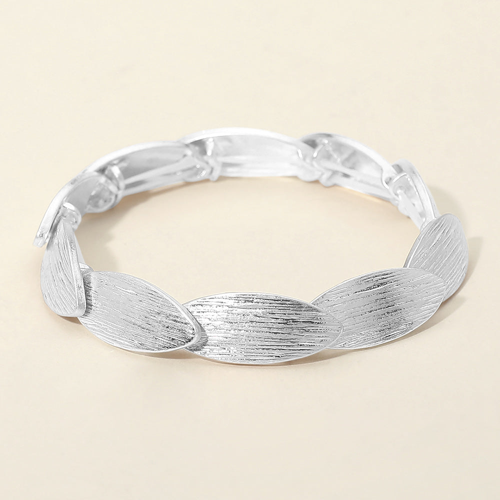 Madeline Love Worn Silver Textured Metal Oval Overlapped Beaded Stretch Bracelet - Bracelets