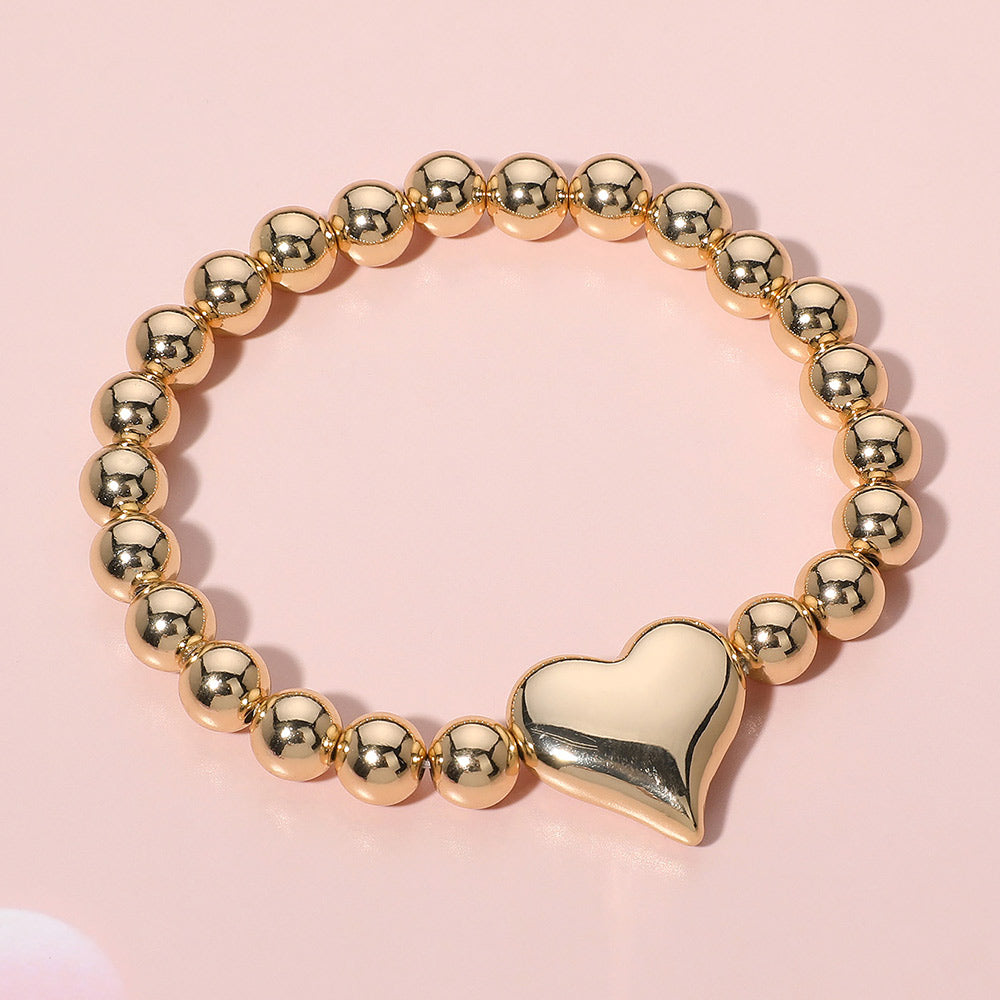 Madeline Love Gold Metal Heart Pointed Ball Stretch Bracelet - Bracelets