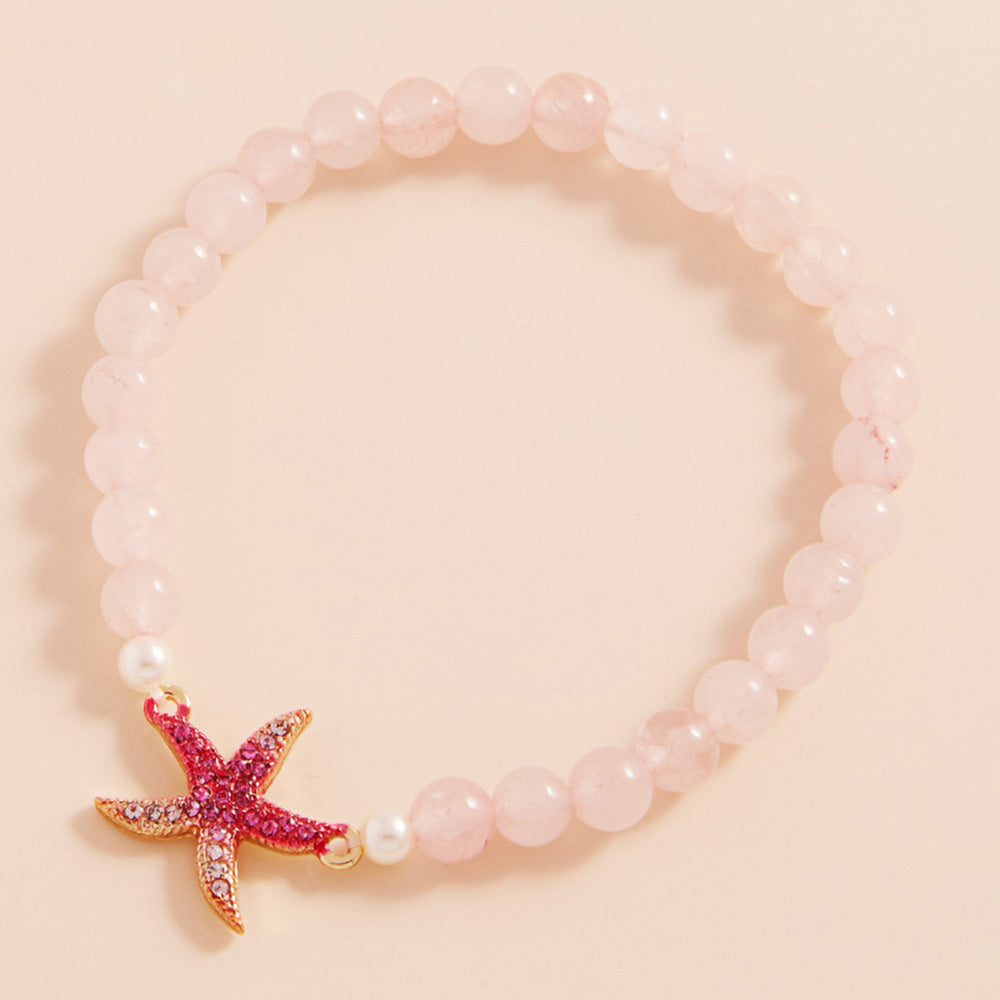 Gold, Pink Stone Paved Colored Metal Starfish Faceted Beaded Stretch Bracelet