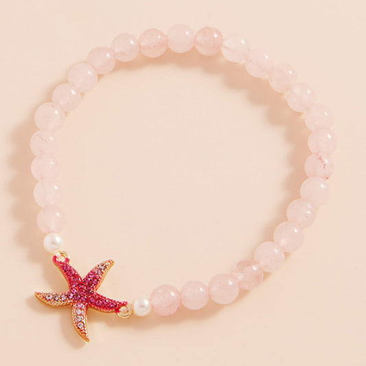 Gold, Pink Stone Paved Colored Metal Starfish Faceted Beaded Stretch Bracelet