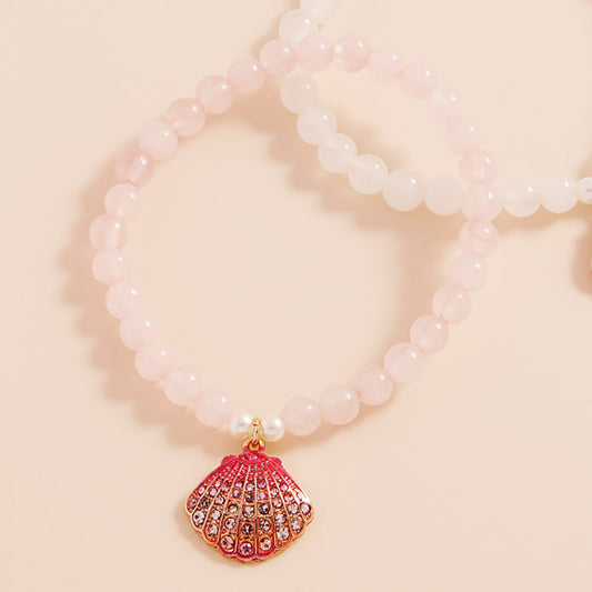 Gold, Pink Stone Paved Colored Metal Seashell Faceted Beaded Stretch Bracelet