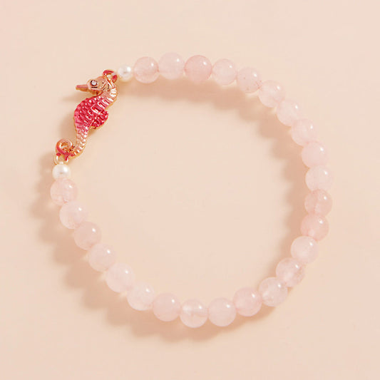 Madeline Love Gold, Pink Stone Paved Colored Metal Seahorse Faceted Stretch Bracelet - Bracelets