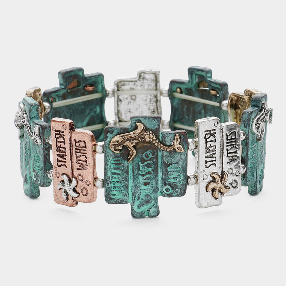 Madeline Love Patina Verdigris 'Mermaid Kisses And...' Embossed Metal Stretch Bracelet - Bracelets