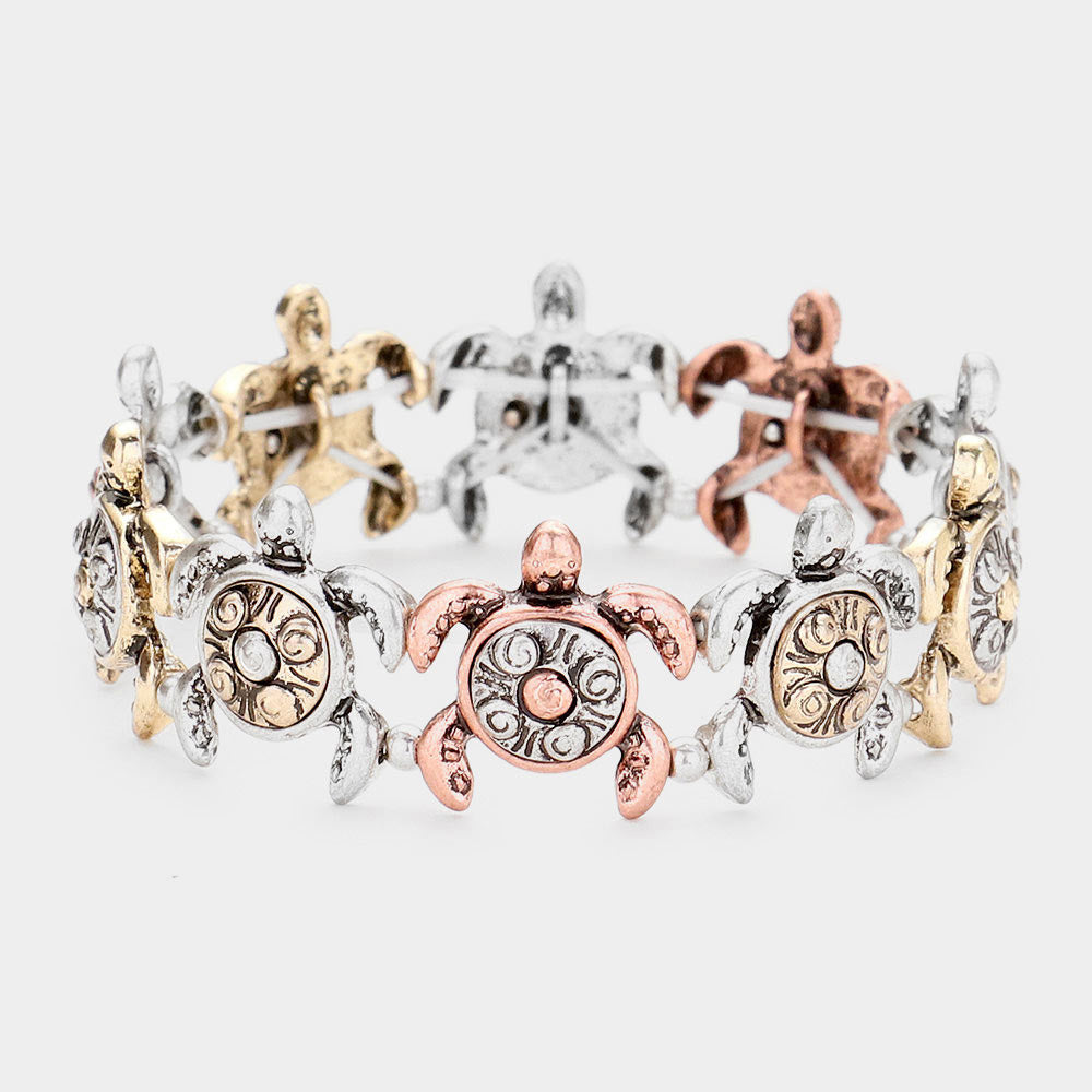 Madeline Love Three Tone Burnished Metal Turtle Stretch Bracelet - Bracelets